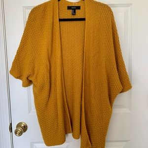 Yellow Knit Short Sleeve Cardigan. Pairs well with jeans & neutral shirts!